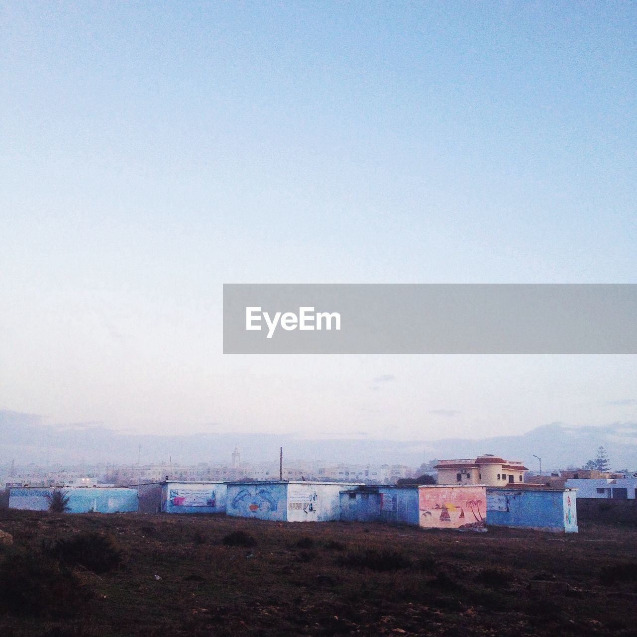 Surrounding wall against clear sky