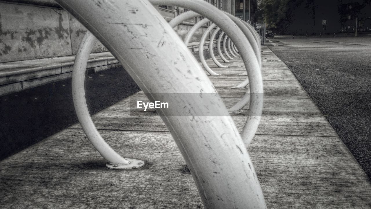 Empty bicycle racks on street