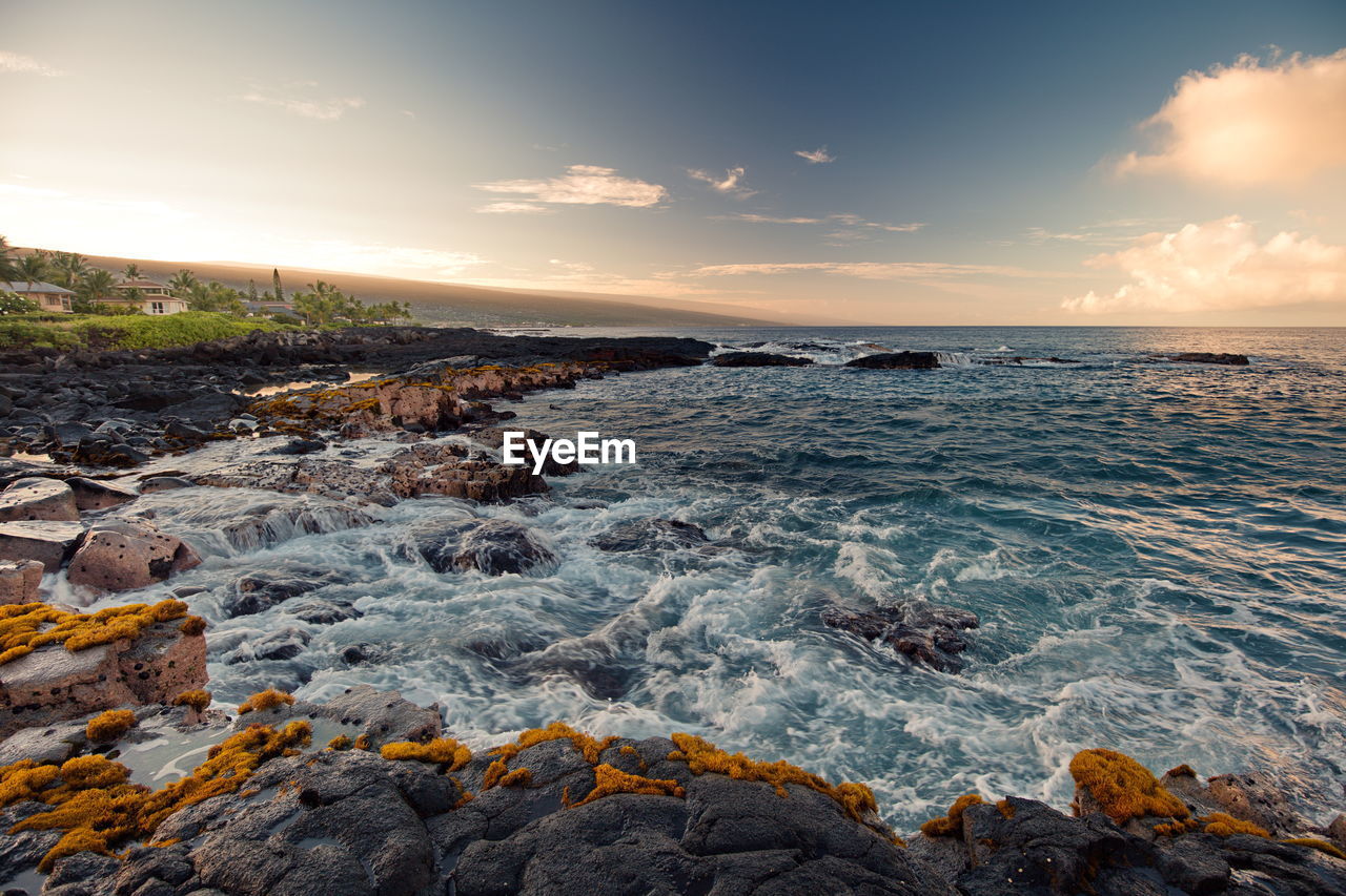 Scenic view of sea against sky during sunset