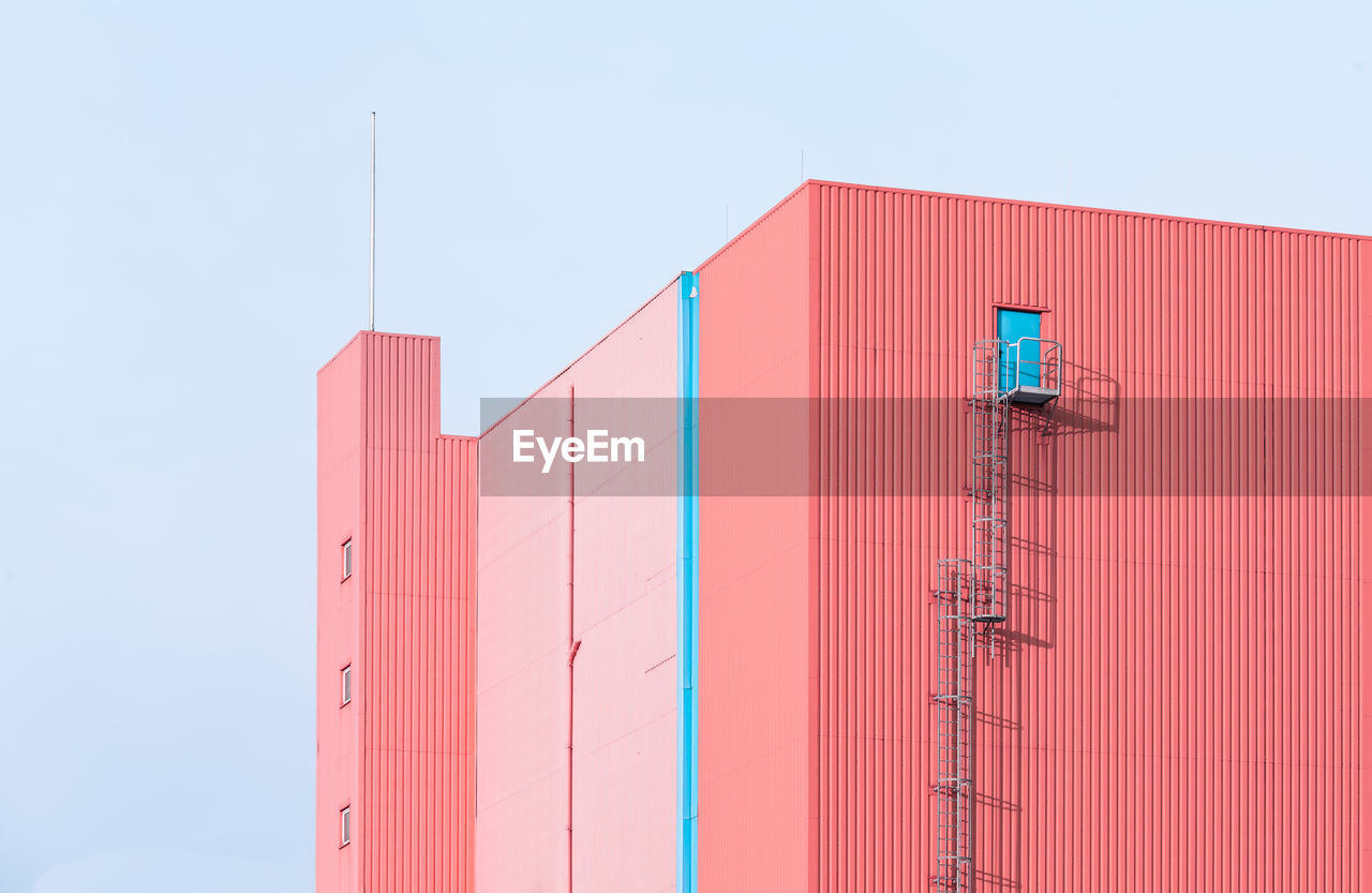 Pink building against sky