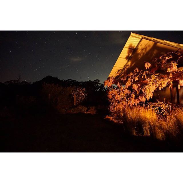 LOW ANGLE VIEW OF BUILT STRUCTURE AT NIGHT