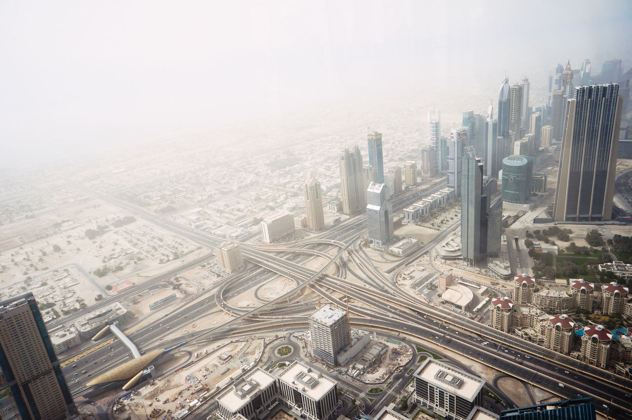 Aerial view of modern highways and buildings in city