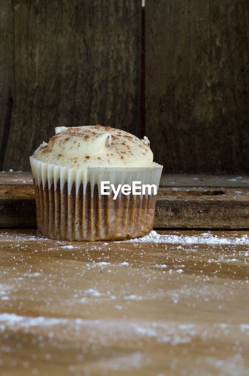 Close-up of cup cake on table