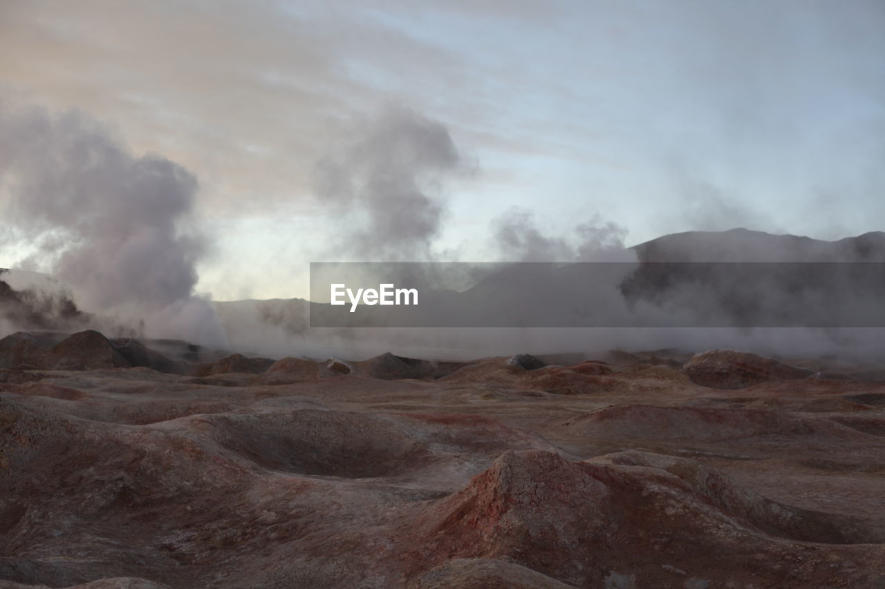 Steam rising from geyser at salar de uyuni
