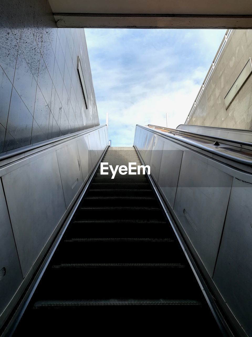 LOW ANGLE VIEW OF STAIRCASE AGAINST BUILDING