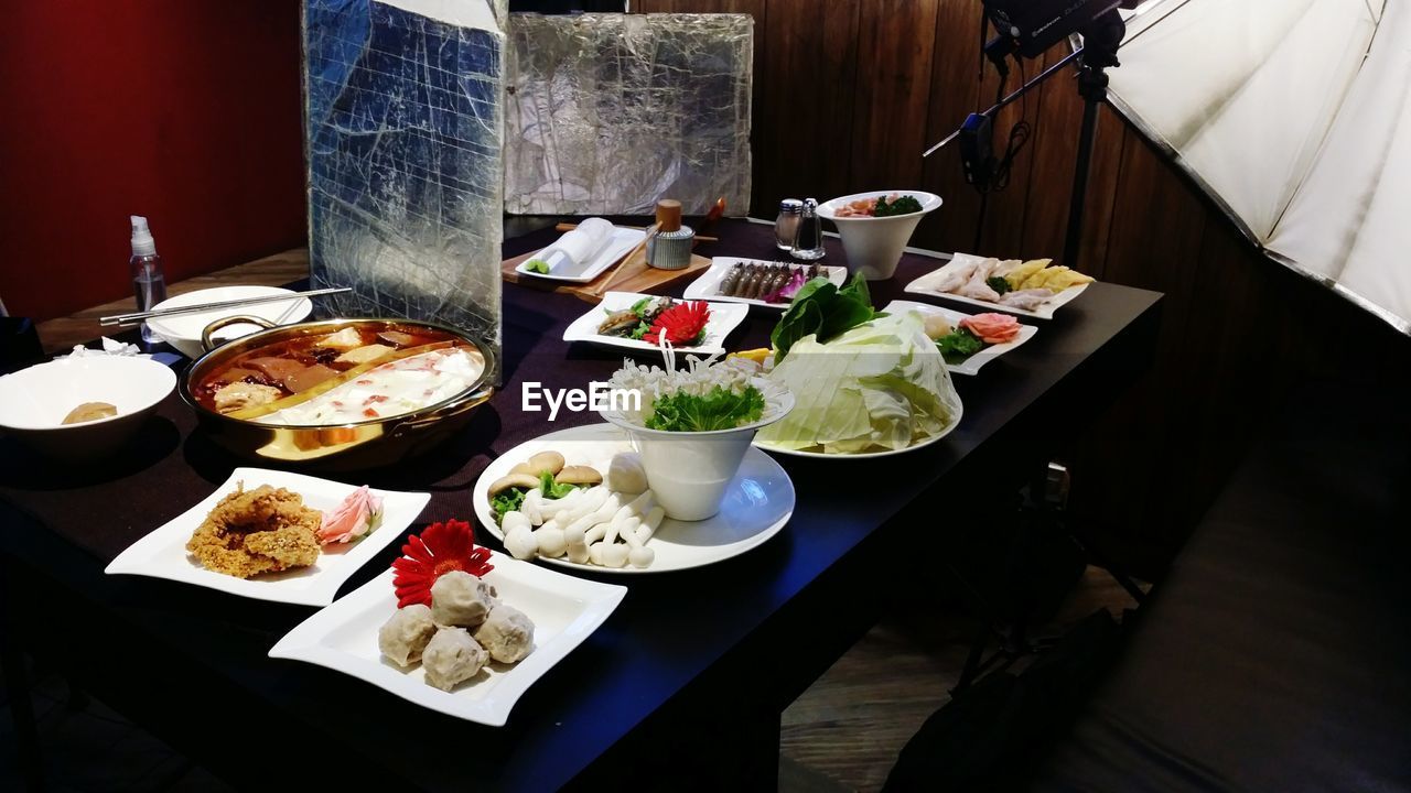 CLOSE-UP OF FOOD ON TABLE