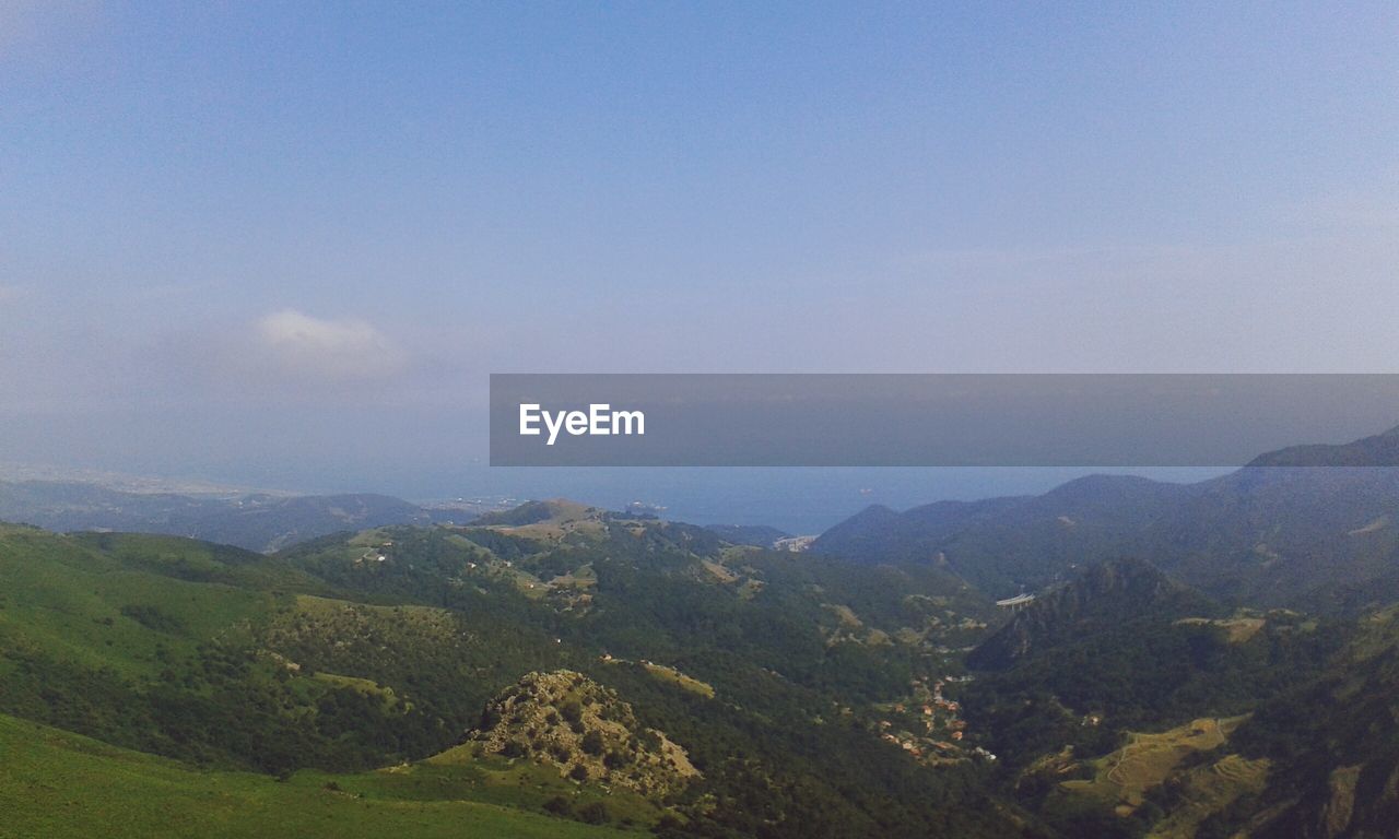 SCENIC VIEW OF MOUNTAIN AGAINST SKY