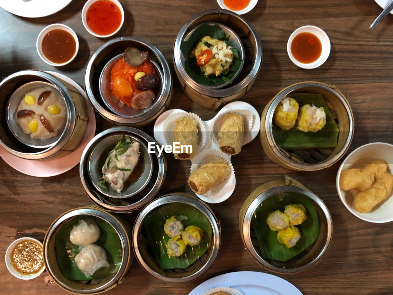 HIGH ANGLE VIEW OF VARIOUS FOOD ON TABLE AT HOME