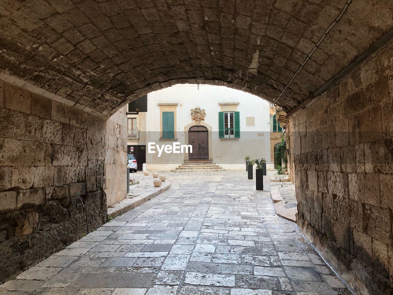 Archway leading towards buildings