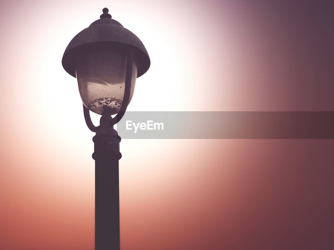 LOW ANGLE VIEW OF STREET LIGHT