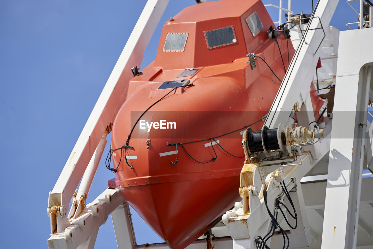 Low angle view of airplane against clear sky