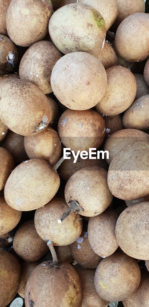 FULL FRAME SHOT OF PEBBLES FOR SALE AT MARKET