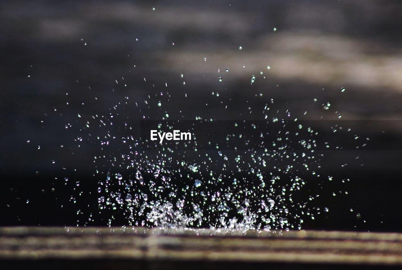 Close-up of water drops on spider web