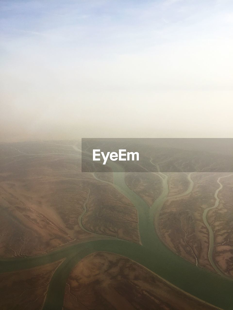 AERIAL VIEW OF FIELD AGAINST SKY