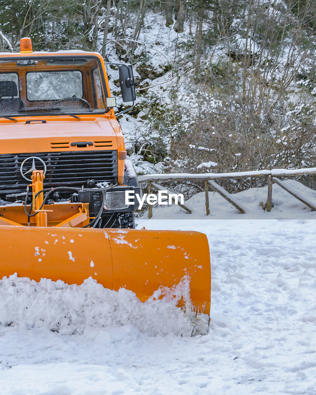 snow, cold temperature, winter, transportation, mode of transportation, snowplow, nature, vehicle, land vehicle, motor vehicle, snow removal, car, tree, orange color, day, no people, land, plant, outdoors, environment, white, frozen, storm