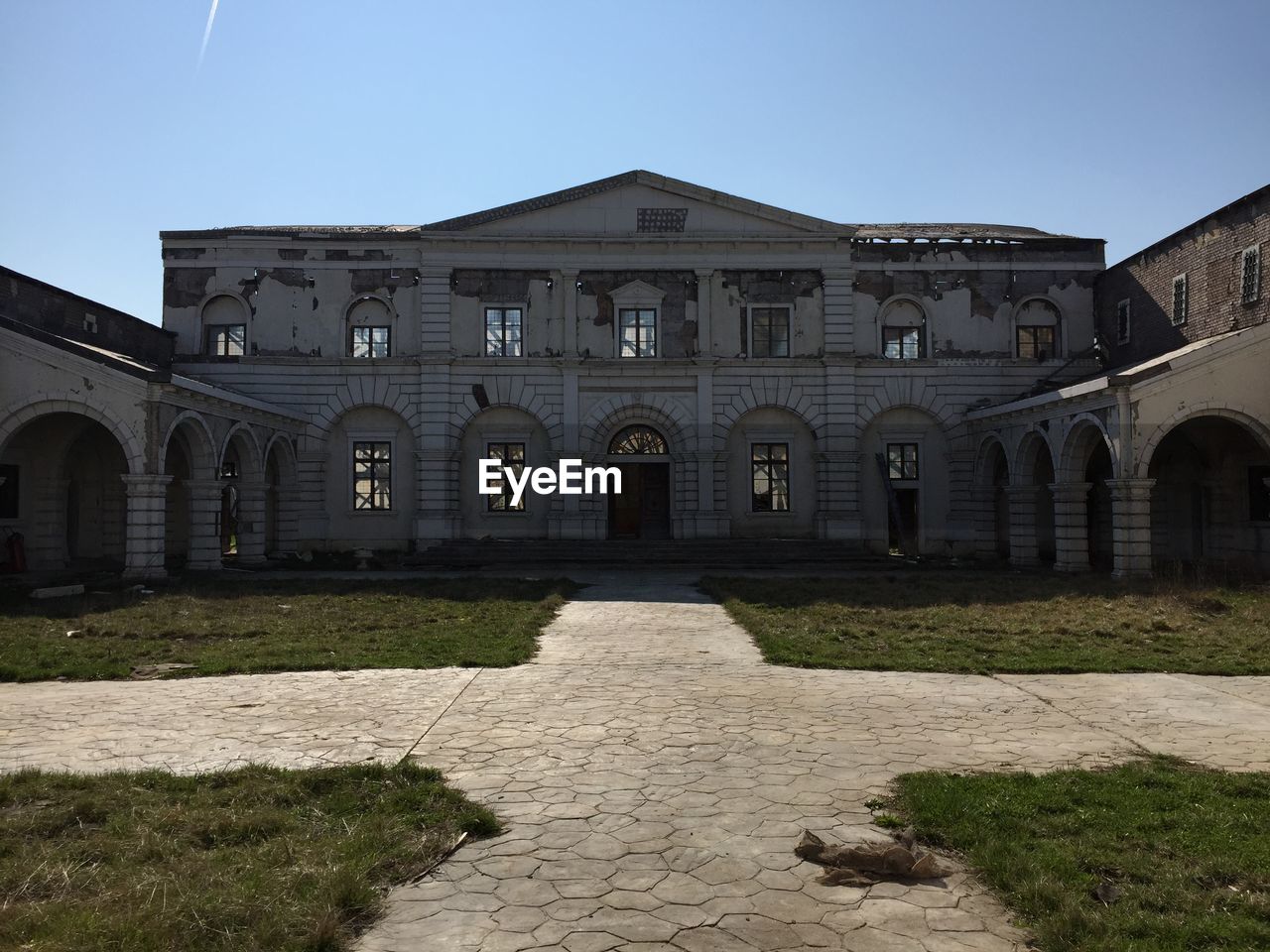 FACADE OF BUILDING AGAINST THE SKY