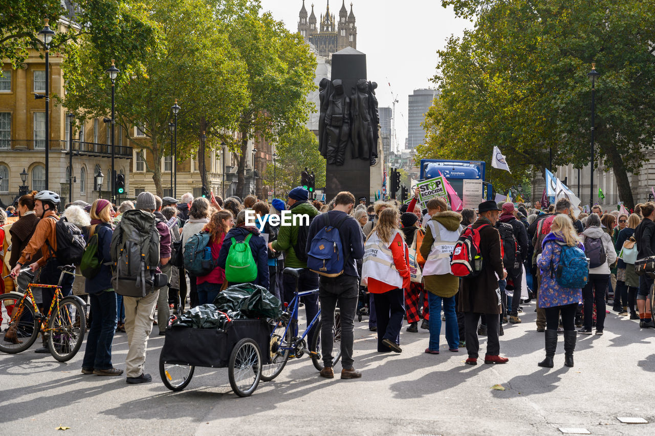 GROUP OF PEOPLE ON STREET