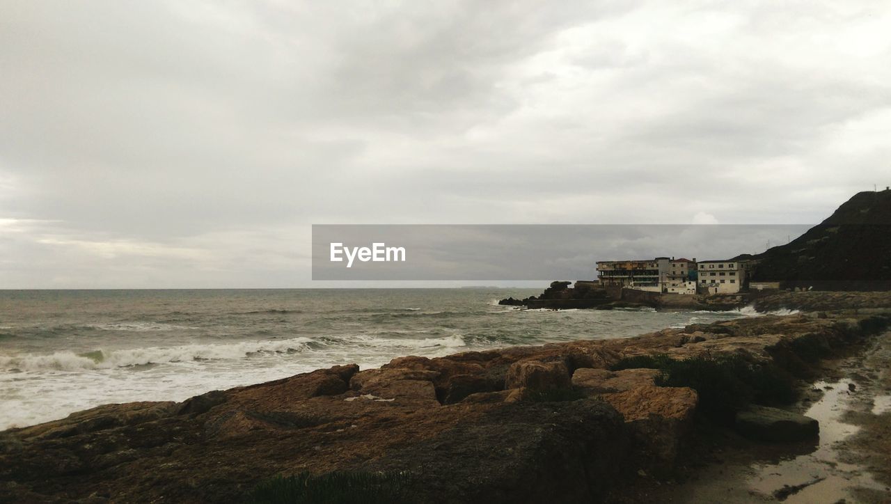 VIEW OF BEACH AGAINST SKY