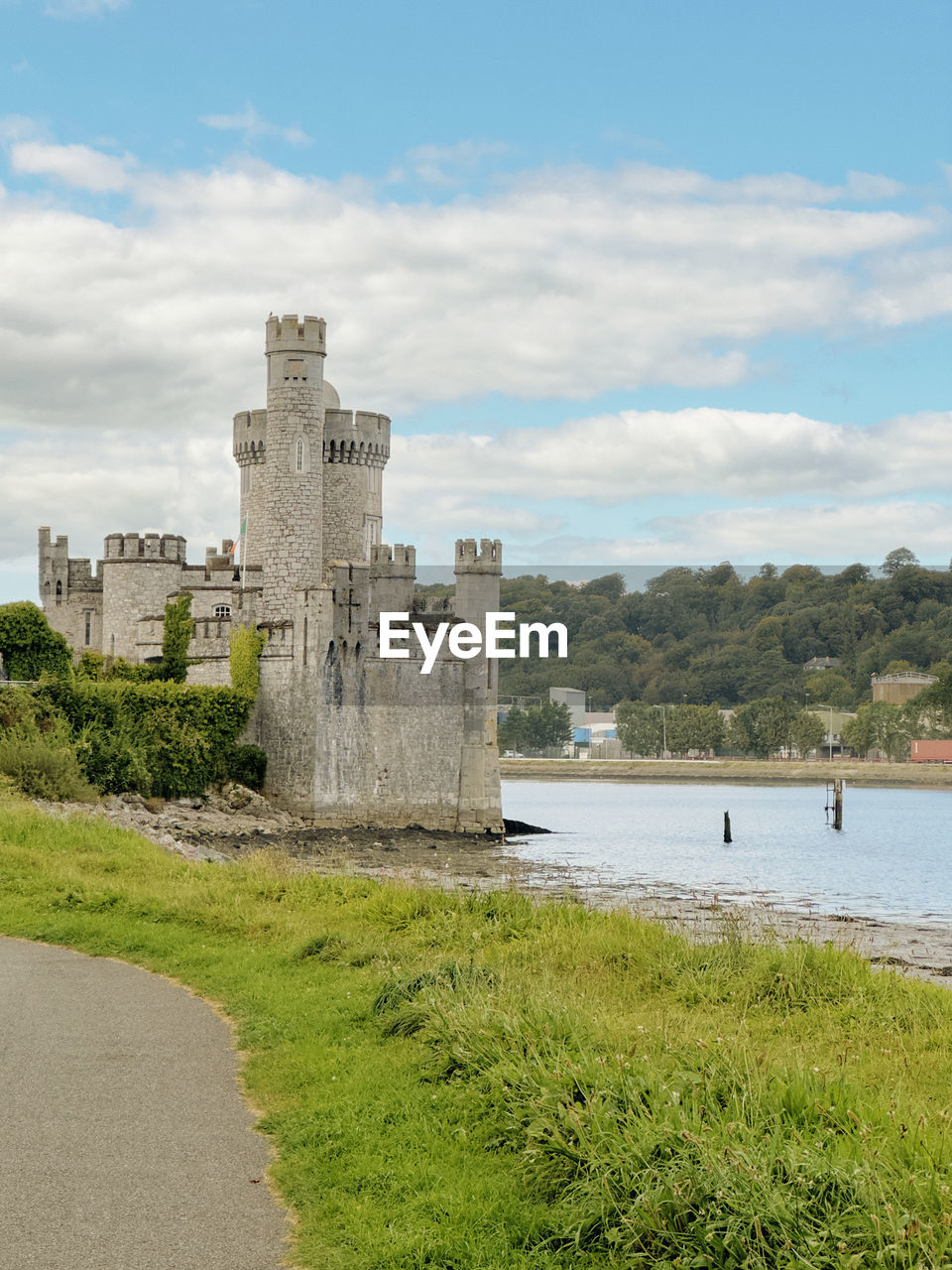 Scenic view of sea against sky with castle