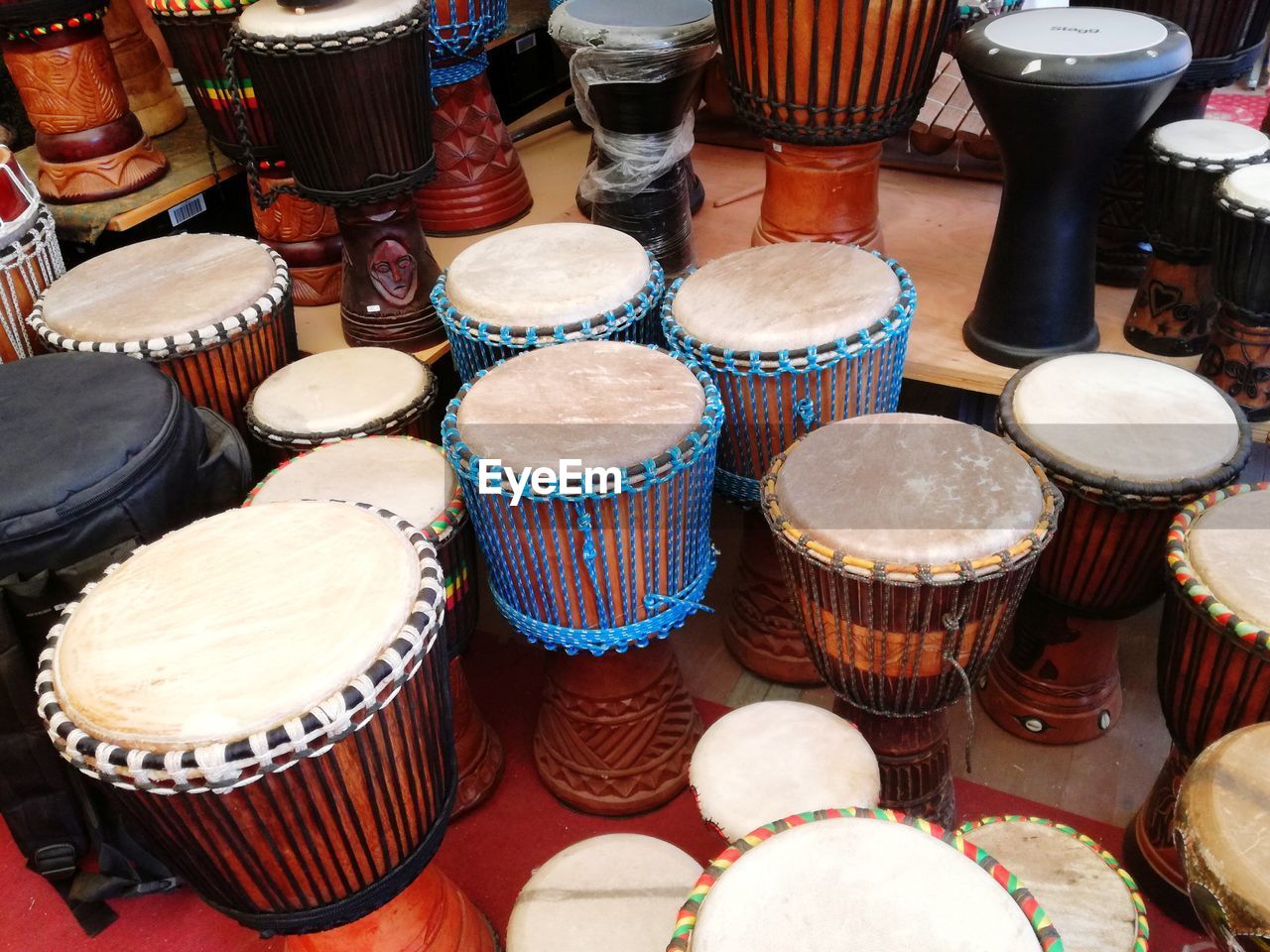 HIGH ANGLE VIEW OF VARIOUS ARRANGED ON TABLE