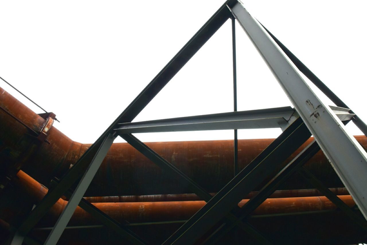 LOW ANGLE VIEW OF METALLIC STRUCTURE
