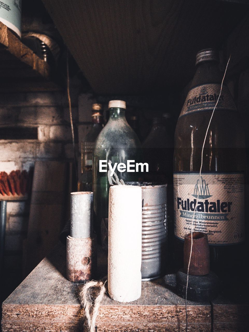 CLOSE-UP OF DRINK IN GLASS BOTTLE