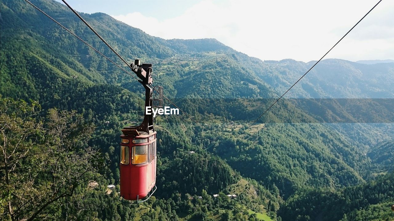 Overhead cable car over mountain