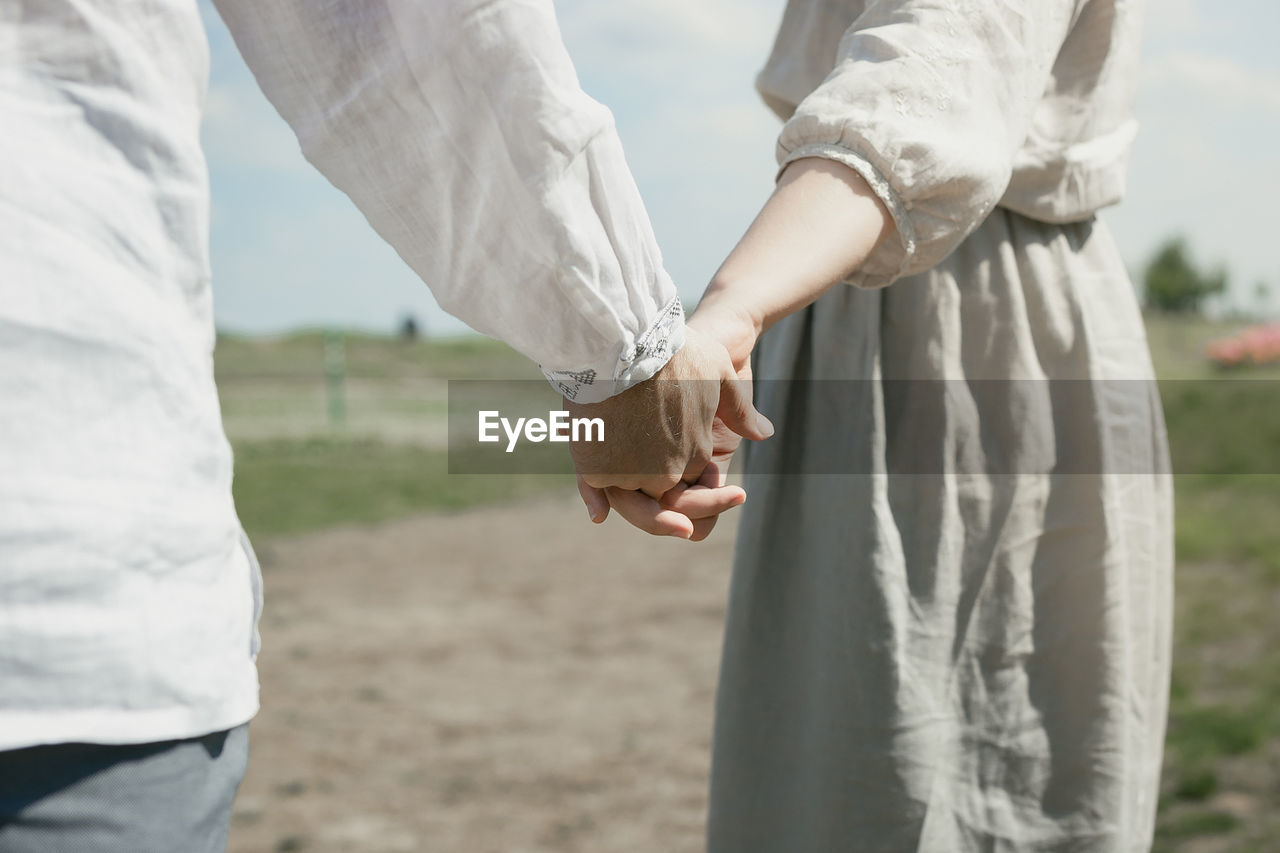 Close up couple wearing folk costumes concept photo