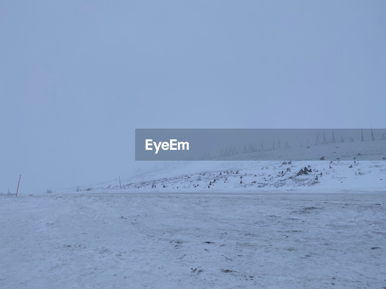 SCENIC VIEW OF SNOWCAPPED MOUNTAINS AGAINST CLEAR SKY