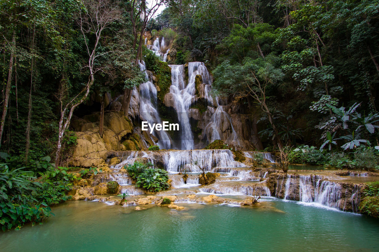 Kuang si waterfalls clear waters in area luang prabang, laos