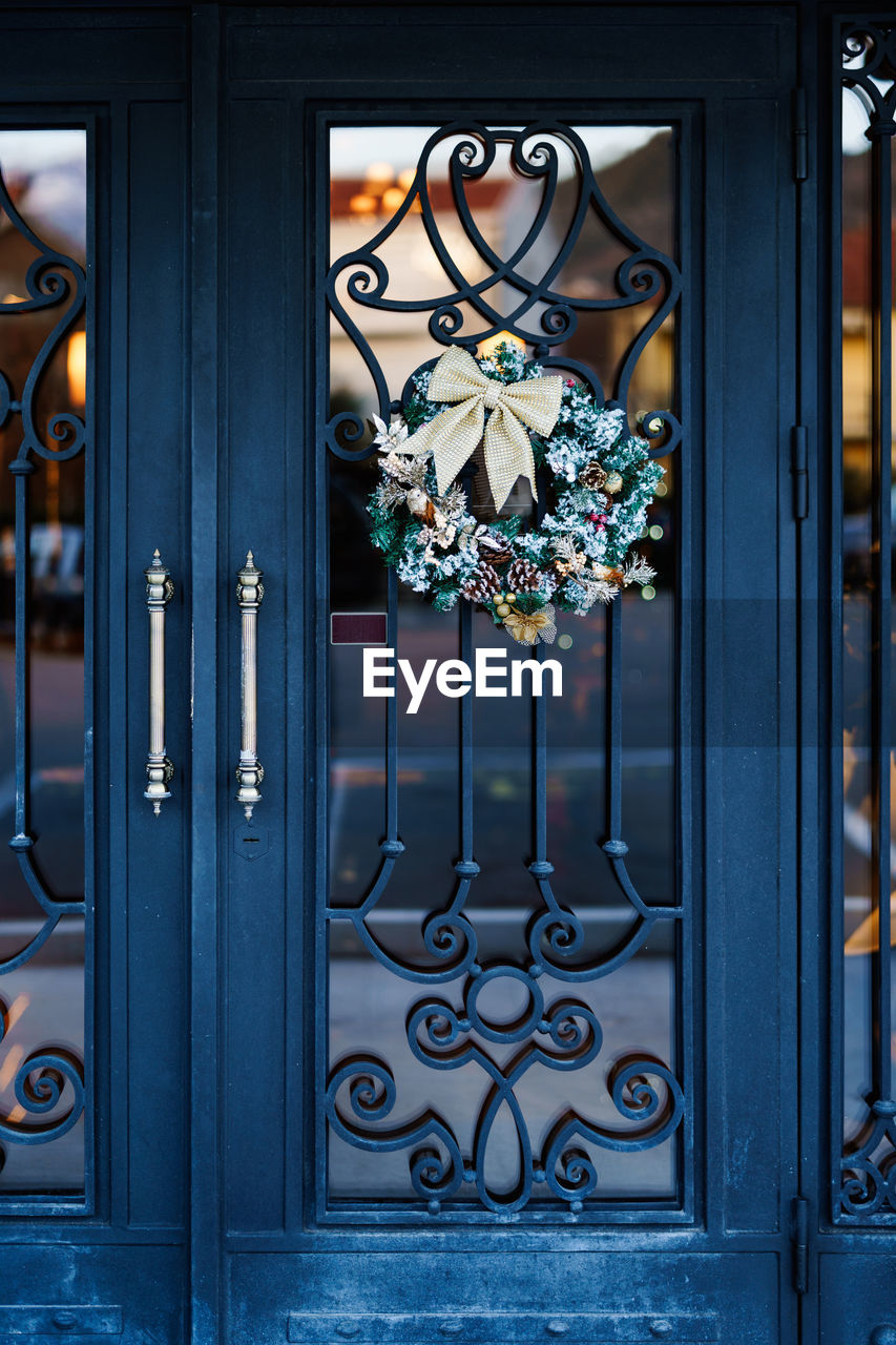 iron, entrance, door, closed, architecture, blue, glass, no people, security, window, protection, gate, building exterior, metal, wrought iron, building, built structure, house, residential district, ornate, outdoors, day, lock, pattern, front door, open, doorway