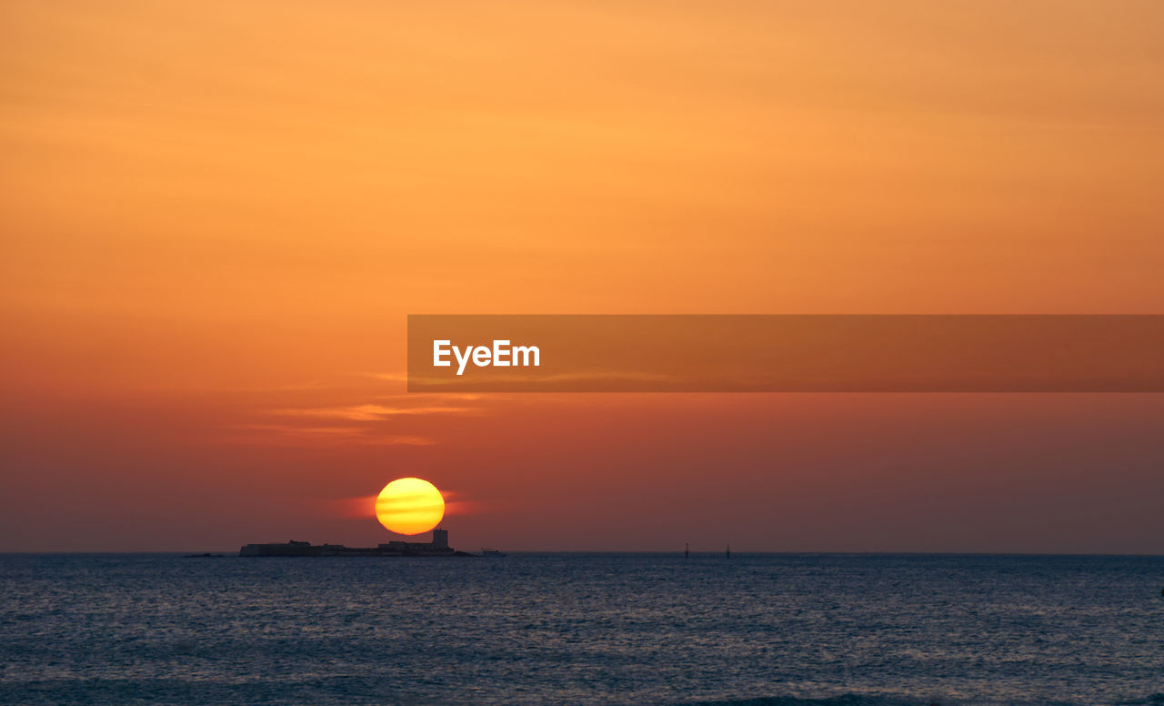 Scenic view of sea during sunset