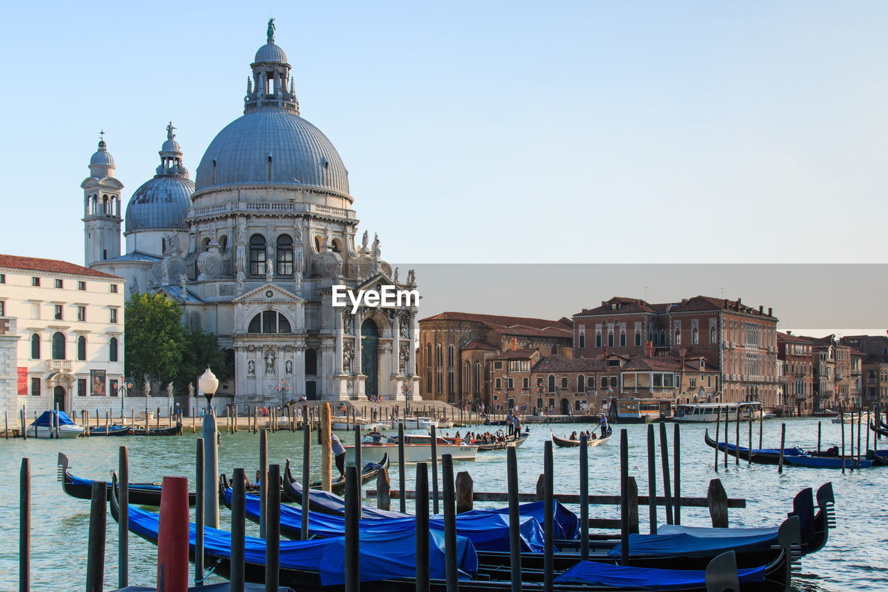 Santa maria della salute by grand canal against sky