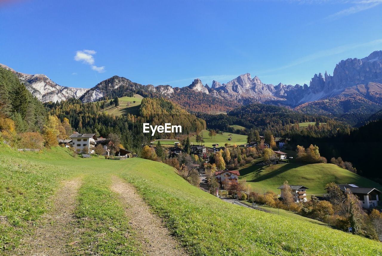 Scenic view of landscape and mountains against sky