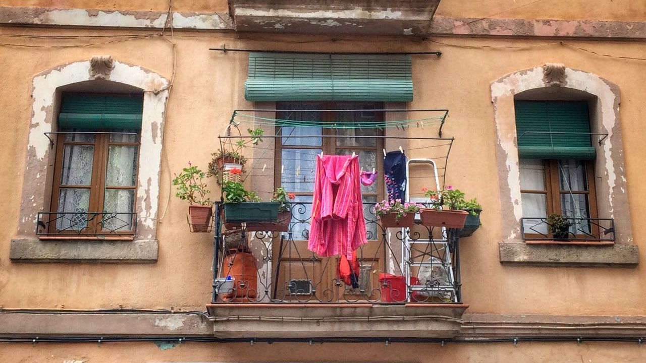 Low angle view of clothes line on balcony