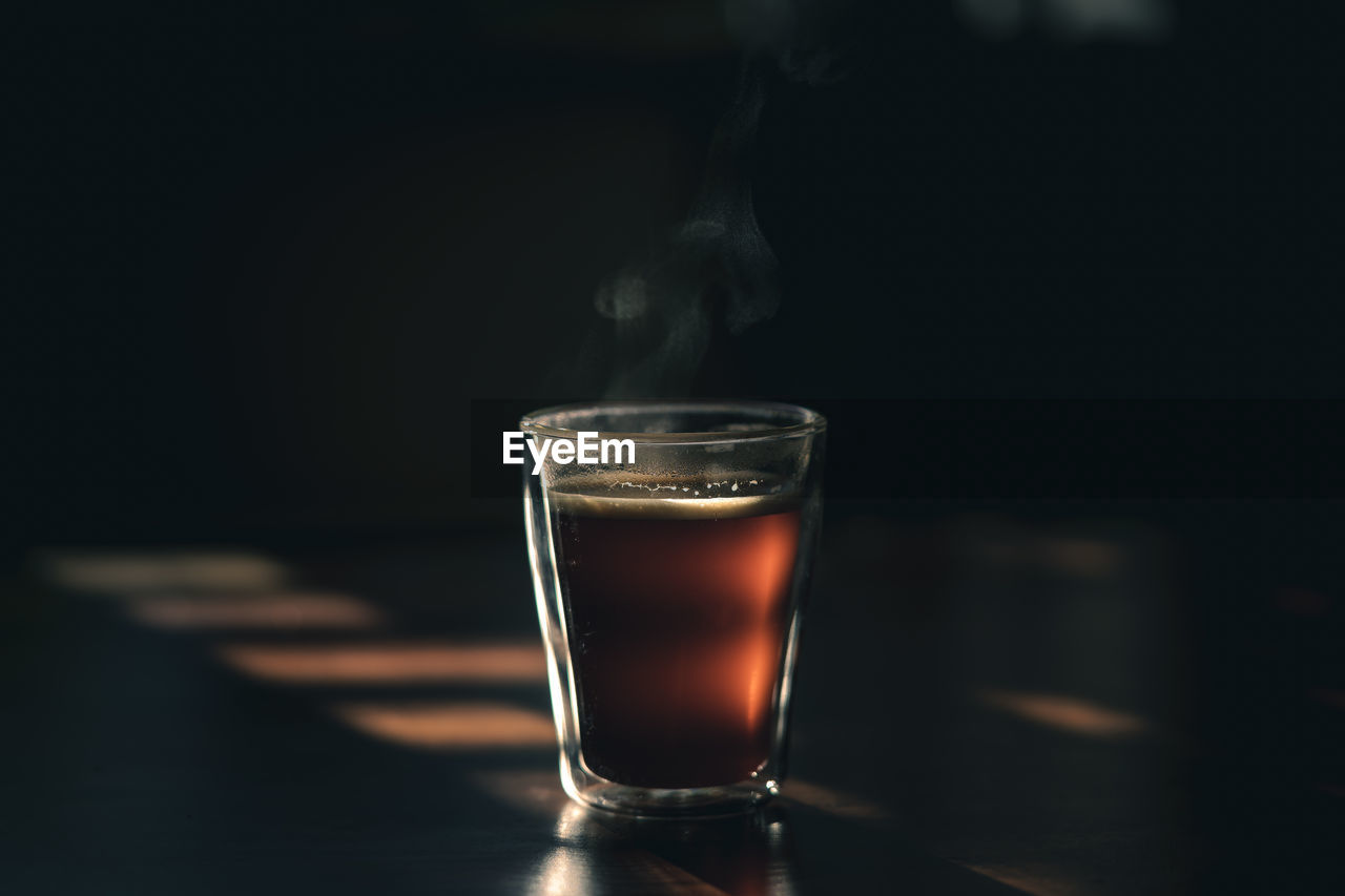 Close-up of drinking glass on table