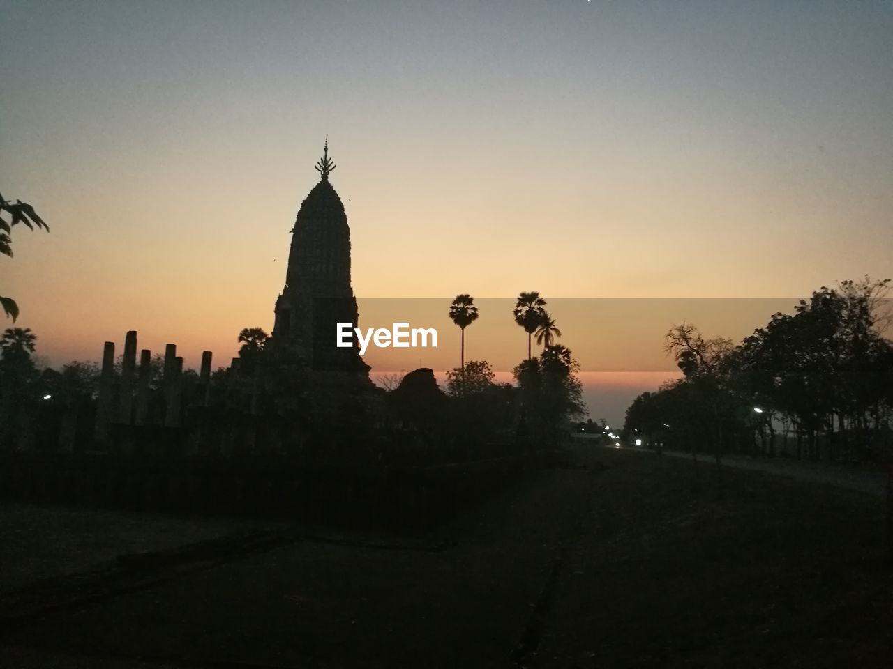 SILHOUETTE TEMPLE AGAINST SKY