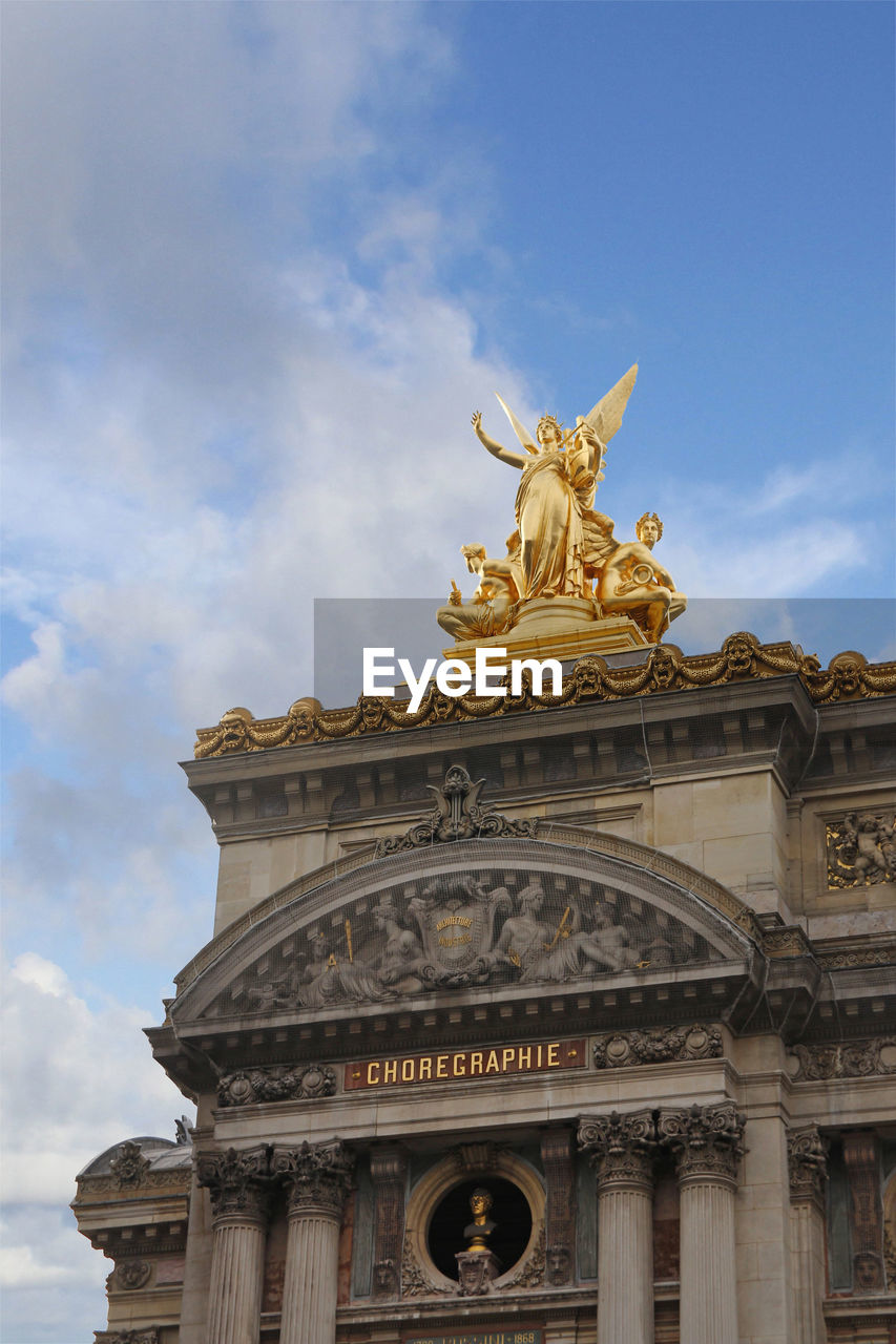 Gilt bronze roof sculpture as harmony by charles gumery at the opera garnier