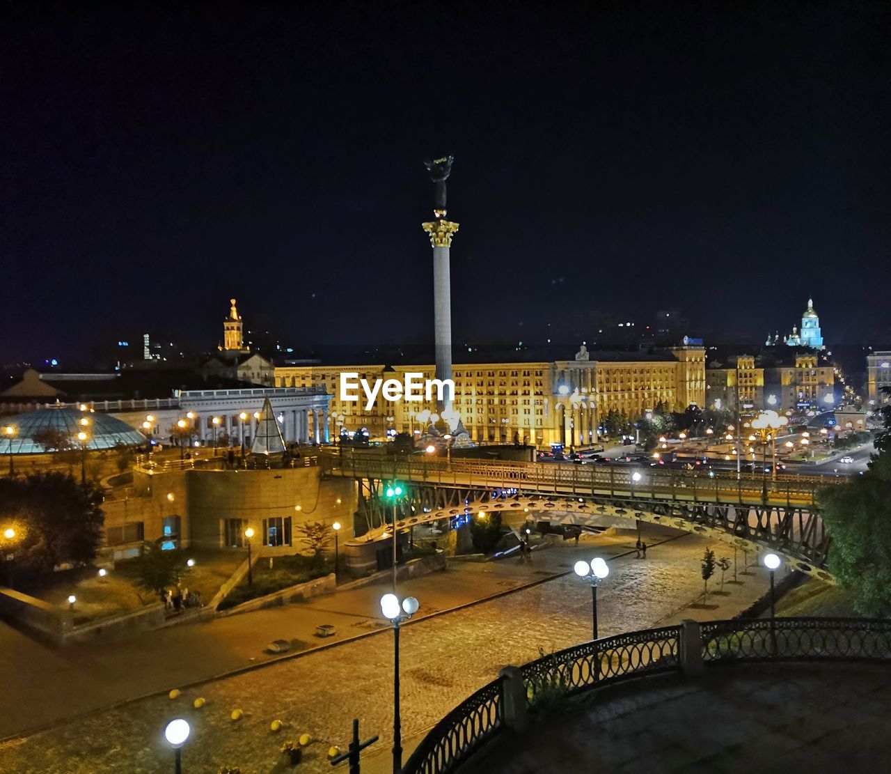 Illuminated buildings in city at night