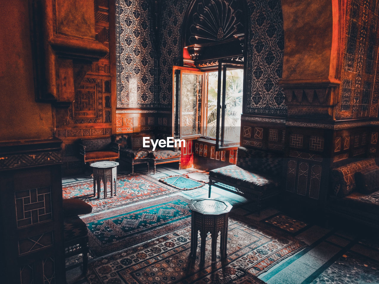 Wooden tables and chairs in old palace