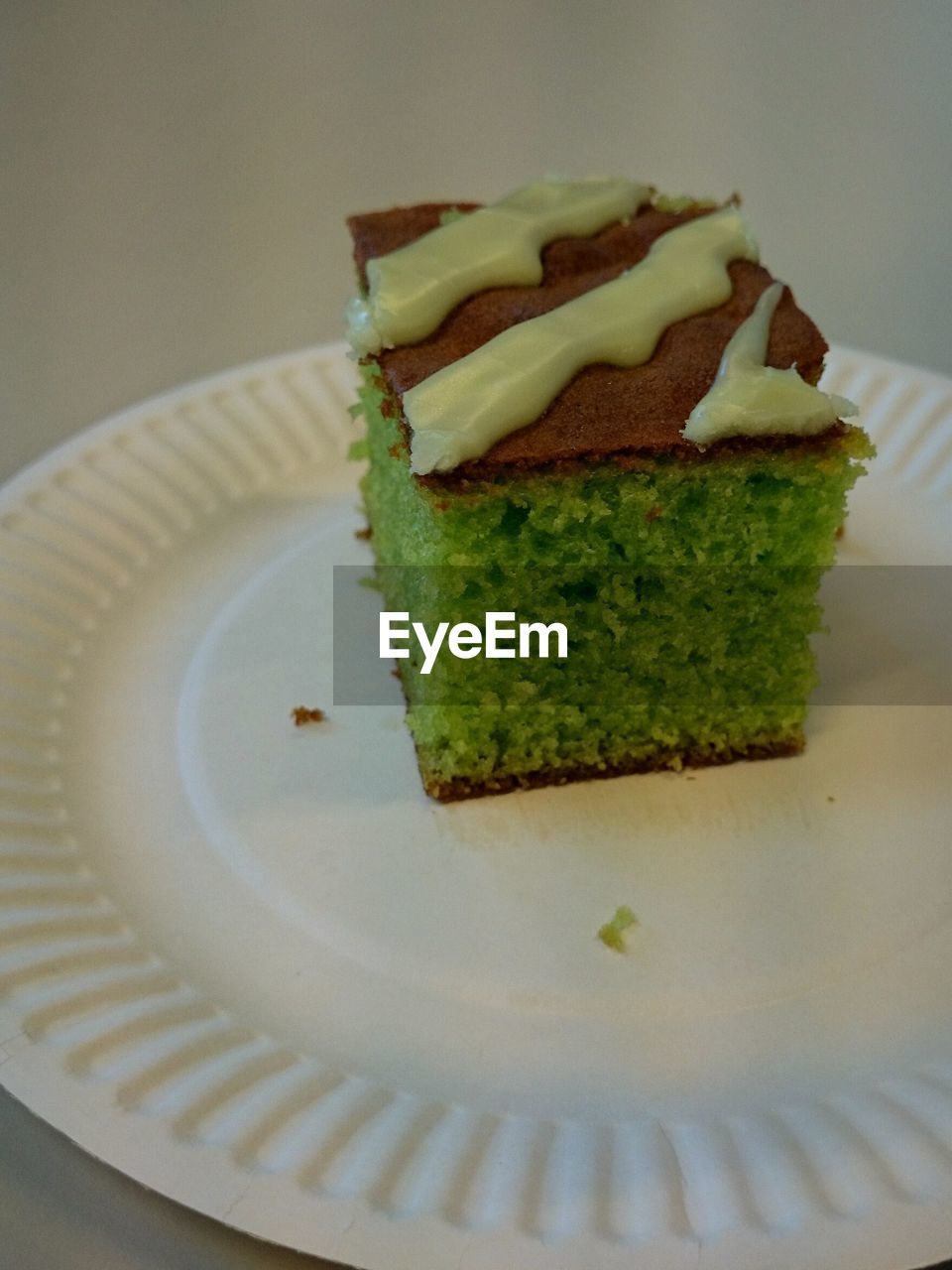 Close-up of green cake served in plate