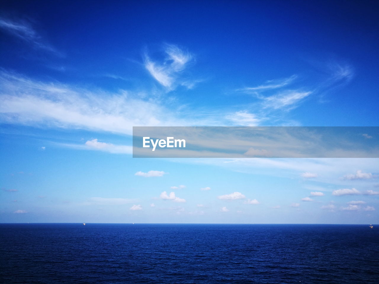 SCENIC VIEW OF BLUE SEA AGAINST SKY