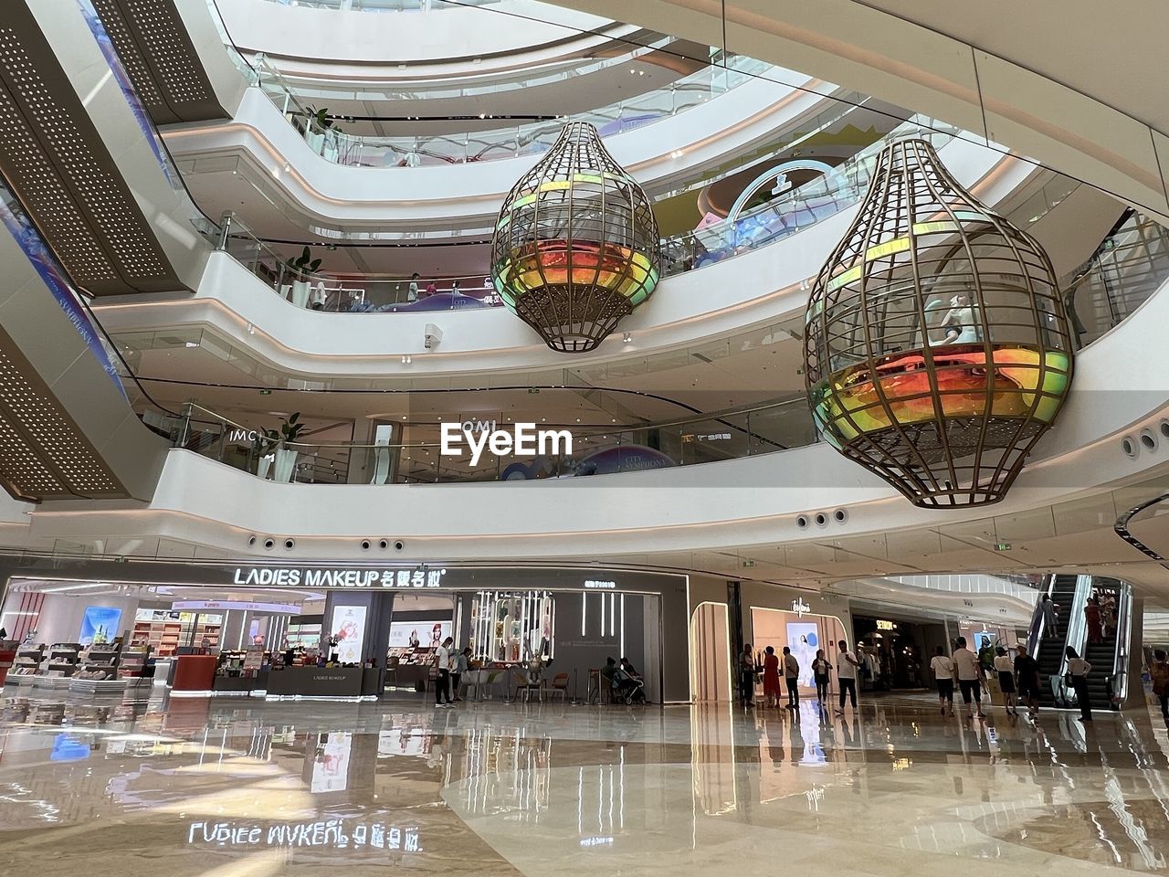 shopping mall, architecture, built structure, travel, indoors, group of people, building, airport terminal, retail, travel destinations, ceiling, transportation, large group of people, city, tourism, convention center, crowd, walking, airport, adult, flooring, business finance and industry, sport venue