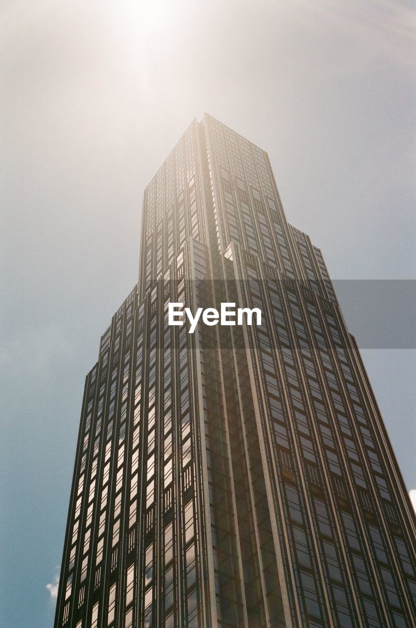 Low angle view of modern building against clear sky