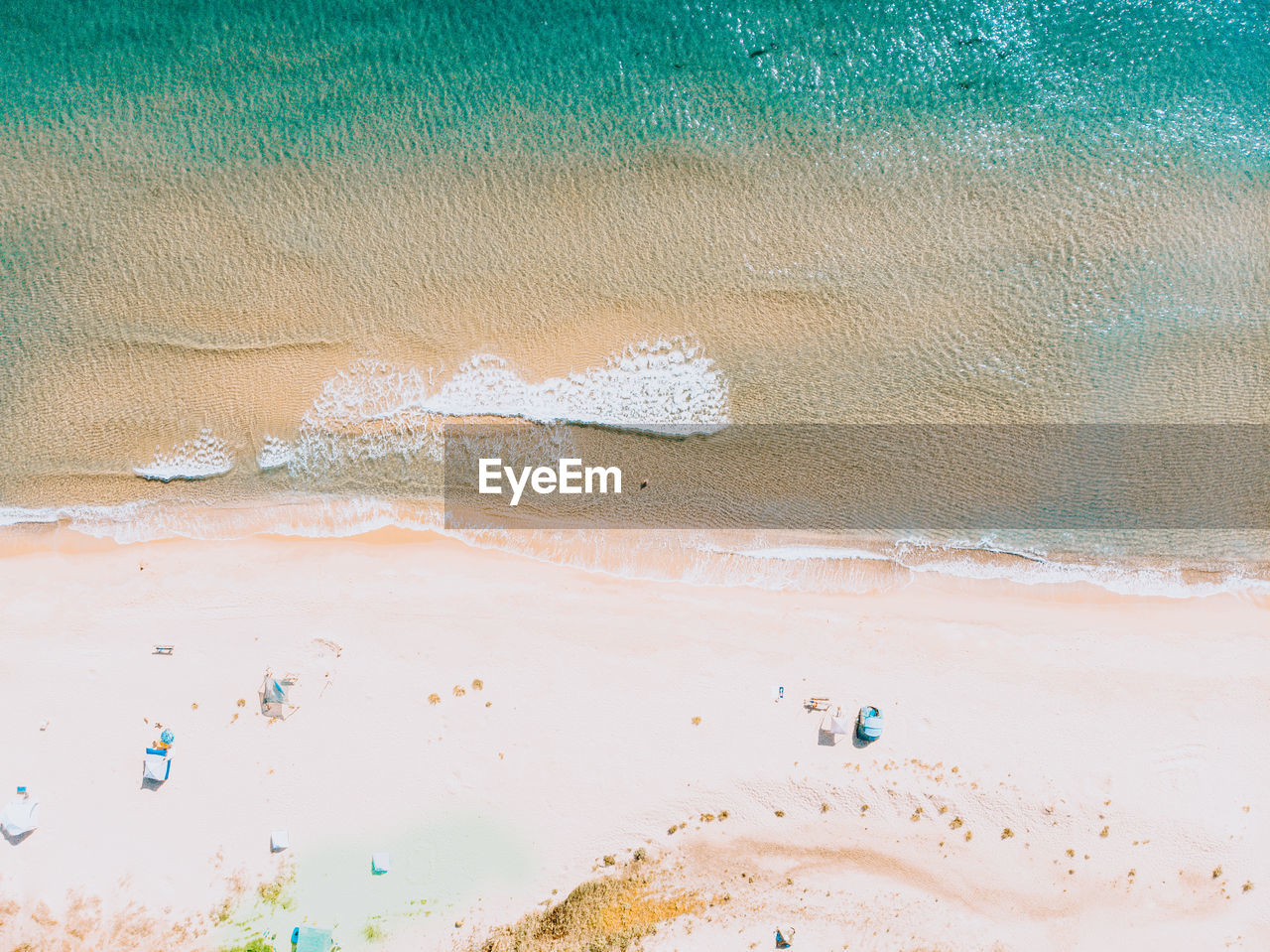 HIGH ANGLE VIEW OF PEOPLE ON SHORE