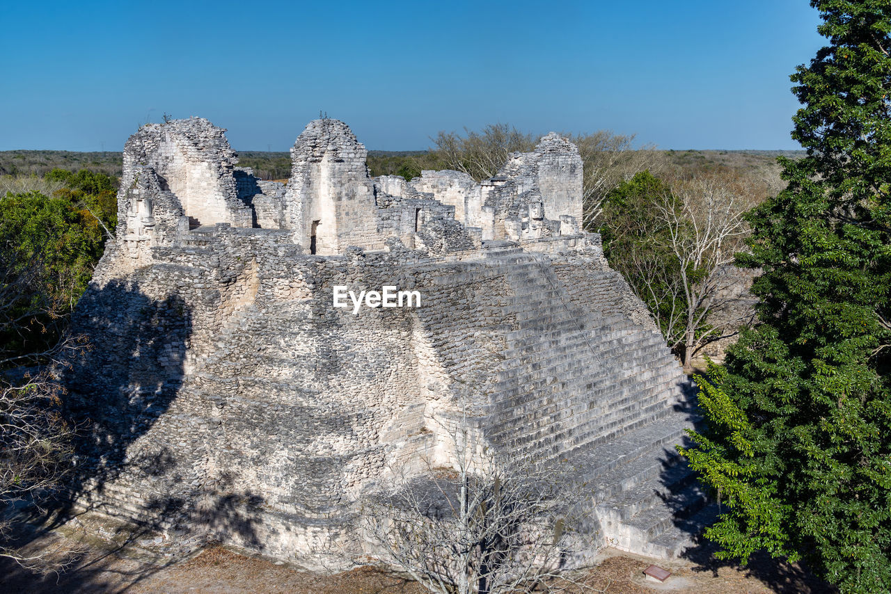 High angle view of mayan ruins at becan on sunny day
