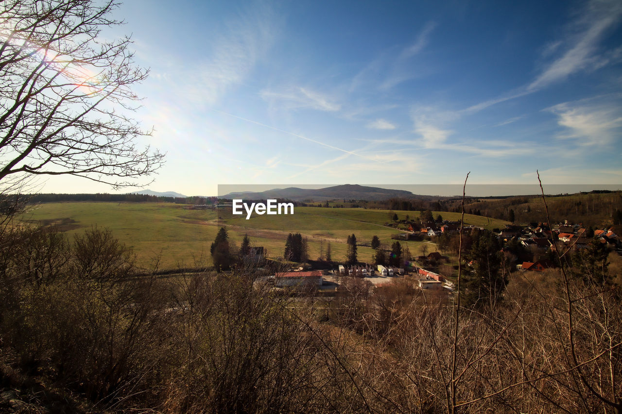 sky, morning, landscape, plant, nature, environment, rural area, hill, tree, land, cloud, autumn, architecture, grass, scenics - nature, field, agriculture, rural scene, beauty in nature, building, outdoors, no people, house, sunlight, built structure, dusk, horizon, building exterior, mammal, day, wilderness, tranquility