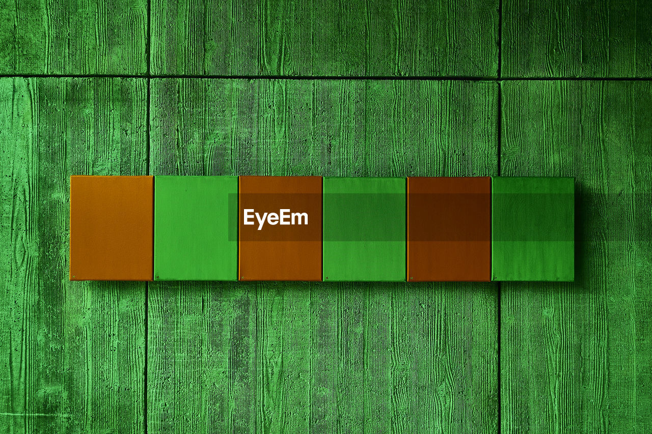 DIRECTLY ABOVE SHOT OF MULTI COLORED GREEN WALL
