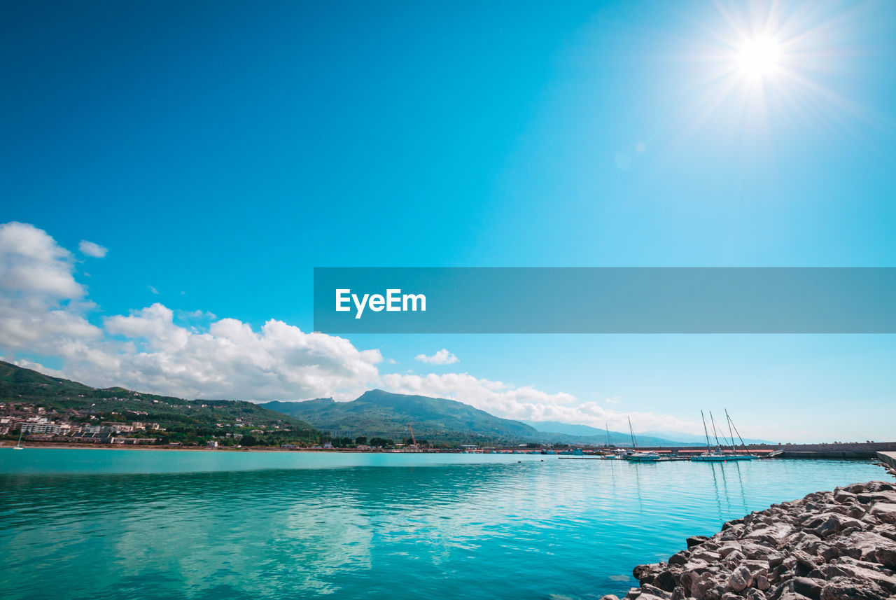 Scenic view of bay against sky