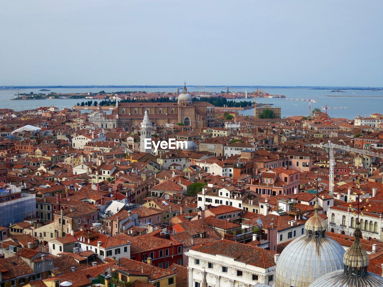 High angle shot of townscape against the sea